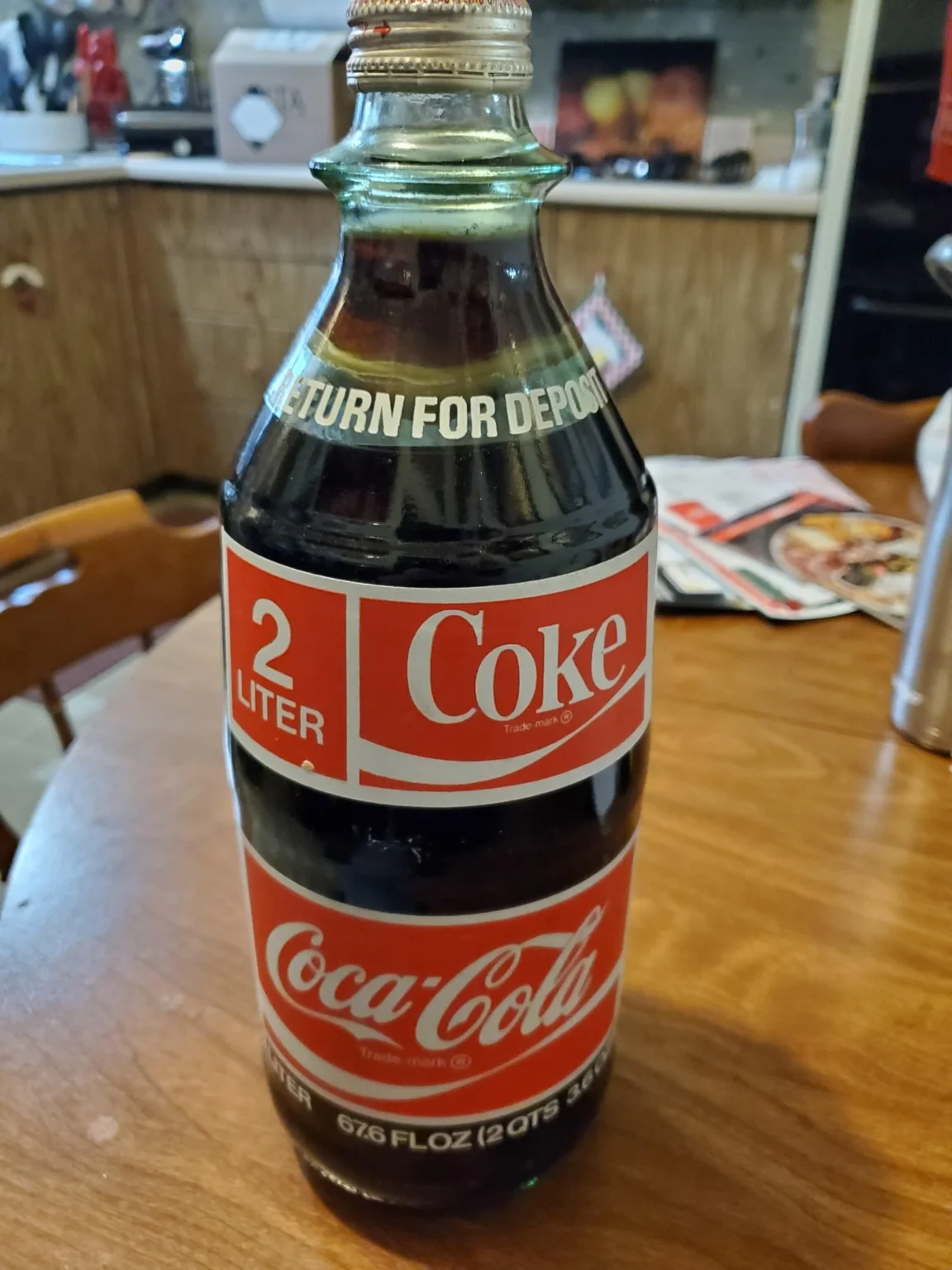 Combien de verres peut-on remplir avec une bouteille de Coca de 2 litres ? Combien de verres peut-on remplir avec une bouteille de Coca de 2 litres ?